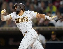 FERNANDO TATIS Jr. La estrella de los San Diego Padres no ha podido responder a las altas expectativas que se tienen sobre su persona y justo ahora vive un momento obscuro en su trayectoria. AP / ARCHIVO