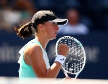La tenista polaca vive un momento inmejorable y apunta como gran favorita para hacerse con el último torneo de Grand Slam del año. AFP/ELSA