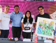 Juan José Frangie le entregó un reconocimiento a la ex clavadista y medallista olímpica por sus 20 años de carrera deportiva. EL INFORMADOR / A. Navarro