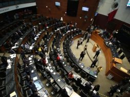 La imagen se da en medio de la discusión a la reforma de la Guardia Nacional que se discute en el Senado, en donde el PRI y el PAN, aliados políticos, se encuentran enfrentados. SUN / ARCHIVO