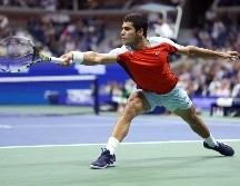 Carlos Alcaraz se enfrentará este viernes al estadounidense Frances Tiafoe por su primera final de Grand Slam y seguir en la carrera por el número uno del mundo. AFP / J. Finney