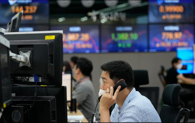 Sólo tres sectores cerraron en rojo, encabezados por el de comunicaciones. AP/A. Young-joon