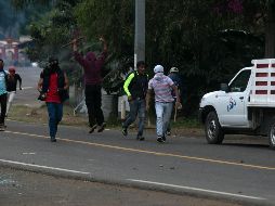 Tras perpetrar los hechos delictivos, los normalistas huyeron con rumbo al municipio de Cherán. SUN/ARCHIVO