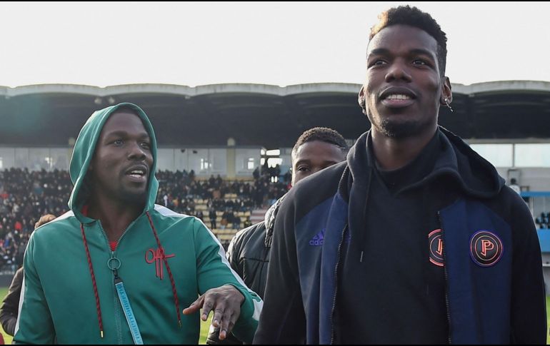 Mathias Pogba (I) se presentó voluntariamente ante las autoridades competentes y fue puesto bajo arresto policial, que puede durar hasta 24 horas. AFP / ARCHIVO