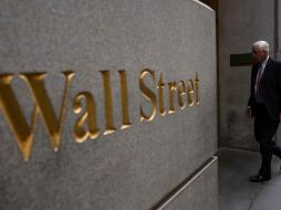 Este viernes, el Dow Jones perdía 139.40 puntos, hasta 30 mil 822.42 unidades. AP/Y. Iwamura