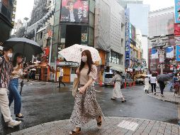 Las duras restricciones de Japón debido al COVID-19 hicieron que la cantidad de visitantes cayera en picada, afectando su sector turístico. AP / ARCHIVO