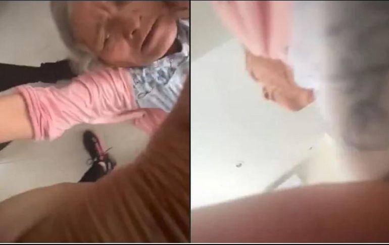 En el video se observa a dos jóvenes que intentan poner de pie a su abuela. ESPECIAL/CAPTURA DE VIDEO