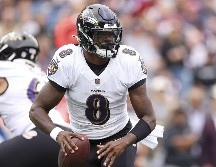 El Quaterback estrella de los Ravens lanzó 4 pases para Touchdown y corrió para un quinto. AFP/M.  Meyer