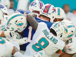 La defensiva de los Dolphins le pudo poner un alto a la poderosa ofensiva de los Bills de Buffalo. AP
