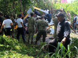 En el helicóptero se transportaban cinco elementos navales, de los cuales tres murieron. EFE/N. Ortiz