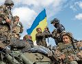 Soldados ucranianos celebran la recuperación de la ciudad Lyman, en la región de Donetsk. AFP