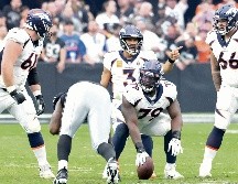 Russell Wilson ha quedado a deber en su llegada a Denver, pero hoy puede mostrar otra cara. AFP/E. Miller