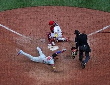 Los Phillies no bajaron los brazos de visita. AFP/S. Revere