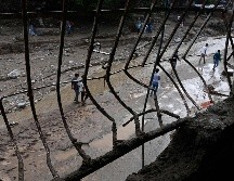 La onda tropical 41 de la temporada provocó tasas máximas de precipitaciones, inundaciones y daños materiales en 11 de los 23 estados venezolanos. AFP/Y. Cortez