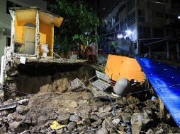 Fotografía de escombros tras un colapso en un condominio debido a las fuertes lluvias de la tormenta tropical 