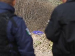 Tras un operativo de búsqueda, autoridades estatales y municipales recuperaron una bolsa y una camiseta de color café en un terreno baldío. EL INFORMADOR / ARCHIVO