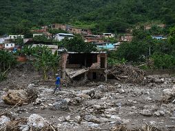 Unos tres mil 200 hombres fueron desplegados en Las Tejerías para las labores de rescate y limpieza. AFP/F. Parra