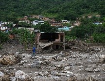 Unos tres mil 200 hombres fueron desplegados en Las Tejerías para las labores de rescate y limpieza. AFP/F. Parra