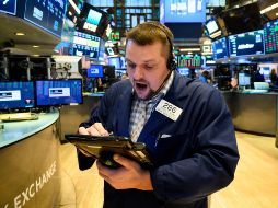 Sólo cerraron cinco empresas en rojo, entre ellas Intel, que perdía un 2.08 por ciento. AFP/ARCHIVO