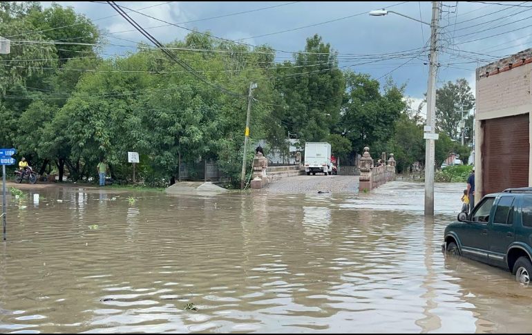 La joven mujer murió de un infarto luego de que su auto quedara varado en una avenida inundada por las fuertes lluvias. SUN/ ARCHIVO