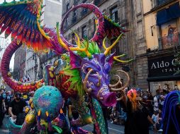 El recorrido inició en el Zócalo capitalino y transcurrió por las avenidas 5 de Mayo, Juárez y Paseo de la Reforma. AFP/C. Cruz