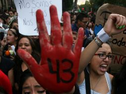 López Obrador destaca que todos los servidores públicos implicados en el caso Ayotzinapa ya tienen orden de aprehensión y algunos ya están detenidos. AP / ARCHIVO