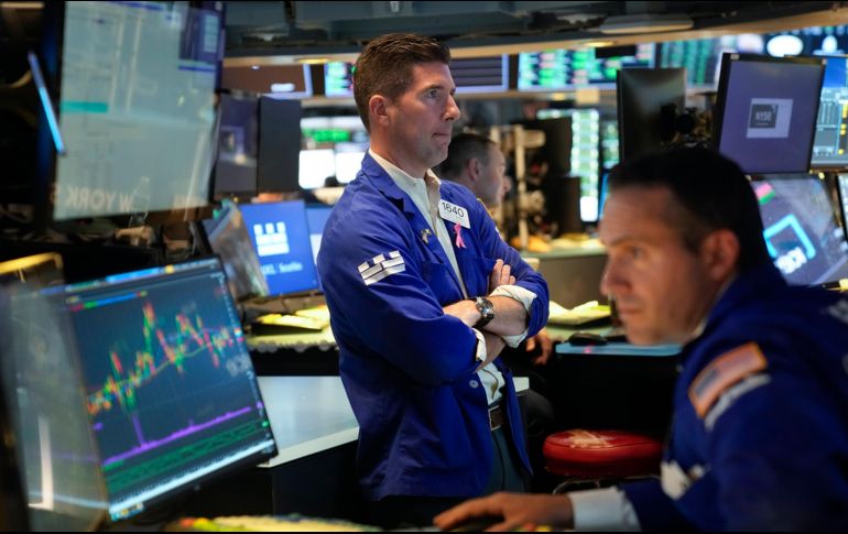 Entre los treinta valores del Dow Jones destacaron las ganancias de Walgreens, Nike y Dow. AP/S. Wenig