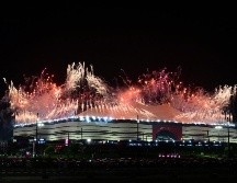 Sobre un fondo negro, la ceremonia comenzó con un guiño al estilo de vida tradicional en el desierto. AFP / M. Medina