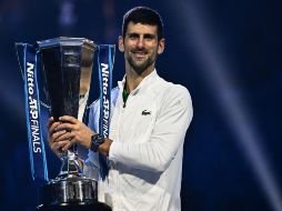 Octavo en la clasificación ATP durante el torneo, el antiguo número uno remontará hasta el 5º puesto mañana lunes. AFP / M. Bertorello