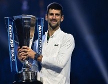 Octavo en la clasificación ATP durante el torneo, el antiguo número uno remontará hasta el 5º puesto mañana lunes. AFP / M. Bertorello