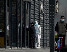 Las cifras de contagios en China son más bajas que en otros grandes países, pero el gobierno se atiene a su objetivo de erradicar las infecciones y aísla a todos los casos. AP/A. Wong