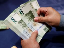 Como mínimo corresponde a 15 días de salario o su equivalente a aquellos que no tienen un año laborando. EFE / ARCHIVO