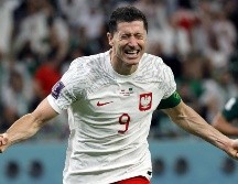 Robert Lewandowski celebra el primer gol que anotó en una Copa del Mundo. EFE / R. Wittek