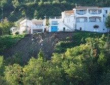 En el lugar, más de 200 miembros de protección civil y fuerzas de seguridad seguían buscando a una decena de desaparecidos. AFP / E. Imperato