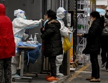 Al estallar la pandemia de COVID-19, China adoptó medidas que eran muy estrictas, pero que no se alejaban de lo que muchos otros países estaban haciendo para tratar de contener el virus. AFP / N. Celis
