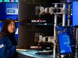 Entre los treinta valores del Dow Jones predominó el color verde, encabezado por Dow Inc, American Express, Boeing y JPMorgan. AP/S. Wenig