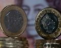 La moneda única se cambió en una banda de fluctuación entre 1.0397 y 1.0530 dólares en el primer día de diciembre. AFP/ ARCHIVO