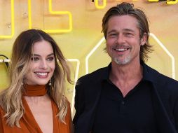 Aunque la actriz Margot Robbie se encuentra felizmente casada, no pudo detener su curiosidad por besar a Brad Pitt, y lo consiguió con ayuda del filme Babylon que se estrenará en 2023. EFE/ARCHIVO