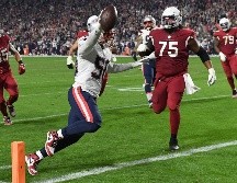 Raekwon McMillan devolvió un balón suelto hasta la zona de anotación en los primeros minutos del tercer cuarto, encaminando el triunfo de los Patriots. AFP/N. Hall