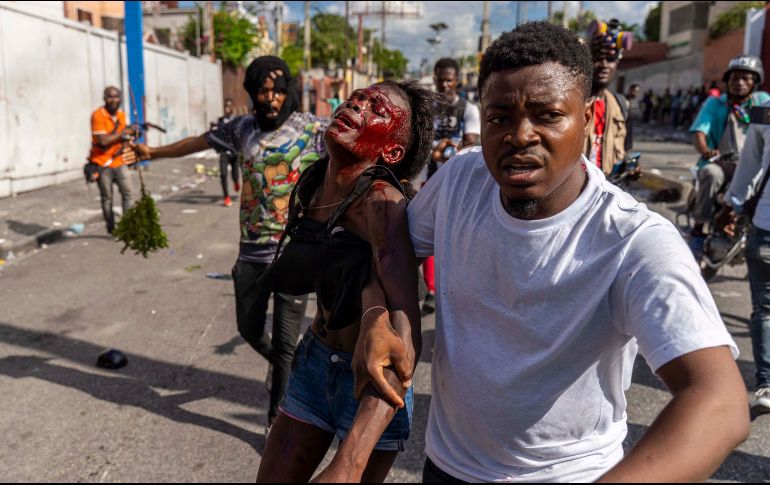 La inmigración se da por el brote de cólera y la violencia pandillera en Haití. AFP/ARCHIVO