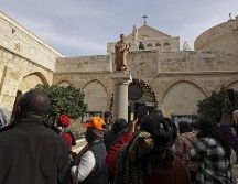 Ahora que se han levantado las restricciones en los territorios palestinos y en Israel, donde se encuentra el aeropuerto más cercano a Belén, la ciudad palestina adquiere un aire festivo. AFP / H. Bader