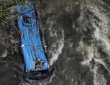 Los cuerpos de las víctimas fueron rescatados ayer. AFP