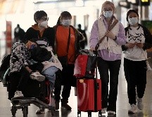 Estados Unidos, Italia, Japón, India y Malasia son algunas naciones que solicitan a los viajeros procedentes de China una prueba de COVID negativa para entrar a su país. AFP