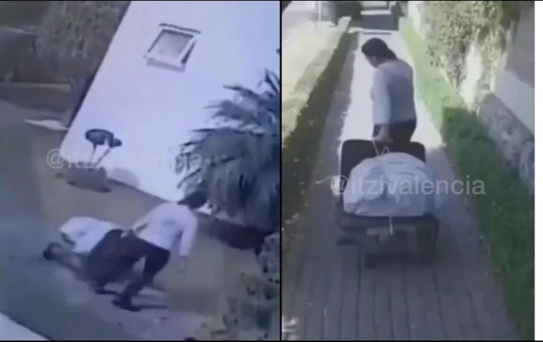 La mujer puso la caja fuerte en un diablito o carriola. SUN