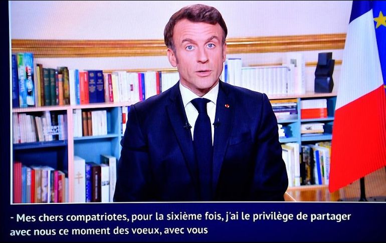 El presidente francés, Emmanuel Macron, habla durante su tradicional mensaje de fin de año. AFP/J. De Rosa