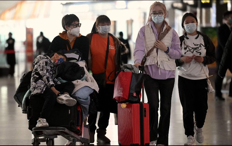 El incremento de contagios en China enciende las alarmas. AFP/ARCHIVO