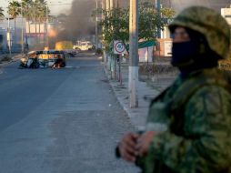 Elementos de los tres órdenes de Gobierno implementan operativos de vigilancia en Culiacán debido a los bloqueos. EFE/J. Cruz