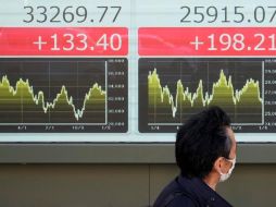 Entre los treinta valores del Dow Jones se destacó la caída de Walgreens, y tras ella Microsoft y United Health. AP/H. Komae