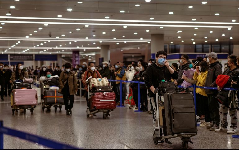 Más de 250 mil pasajeros ingresaron a China. EFE/A. Plavevski
