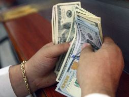 El paso mexicano es la sexta moneda emergente que presenta mayores pérdidas frente al dólar esta mañana de jueves. EL INFORMADOR/ARCHIVO